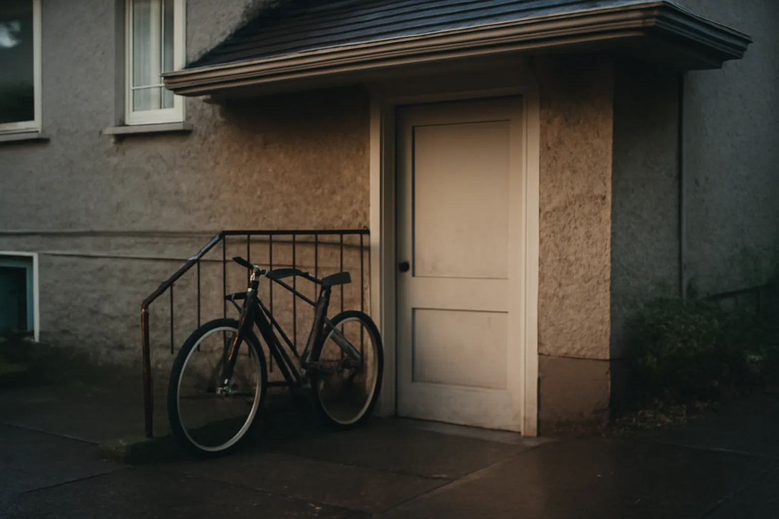Basement secondary suite entrance on a Vancouver rental house in morning light